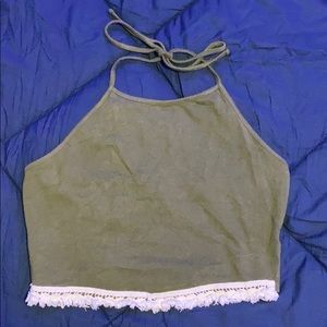 Cute army green crop top with small white tassels!